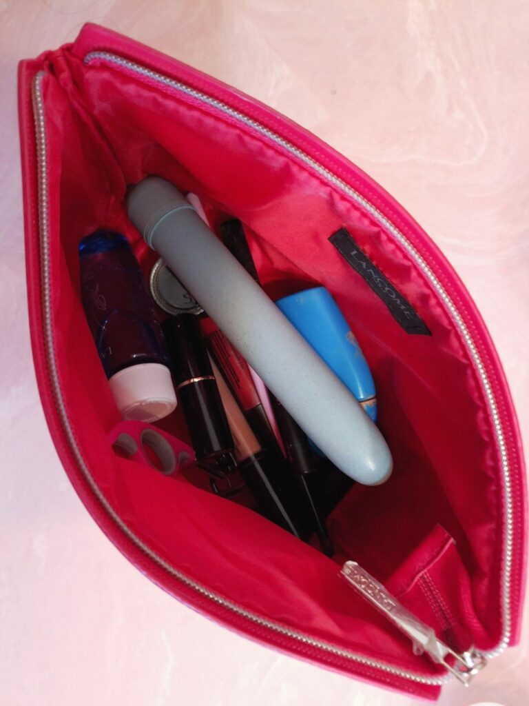 [Image: Blush Gaia Eco vibrator in purse]