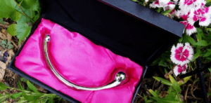 njoy Pure Wand steel dildo in pink satin box, featured on Super Smash Cache's review!