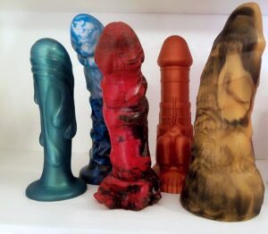 A rainbow of shimmery silicone fantasy dildos