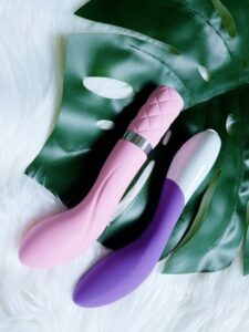 LELO Mona 2 purple and BMS Factory Pillow Talk Sassy pink side-by-side