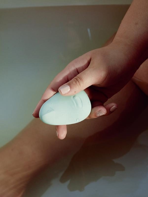 Dame Pom vibrator in hand - photo from the Dame Products website