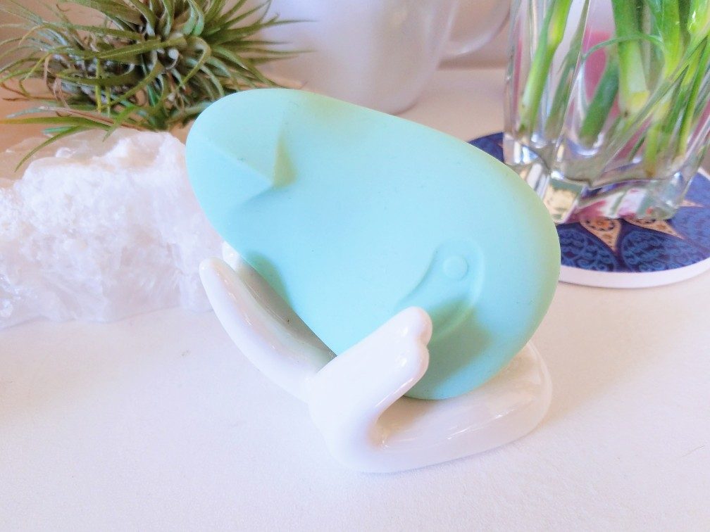 Dame Pom jade green couples' silicone vibrator in my living room decor