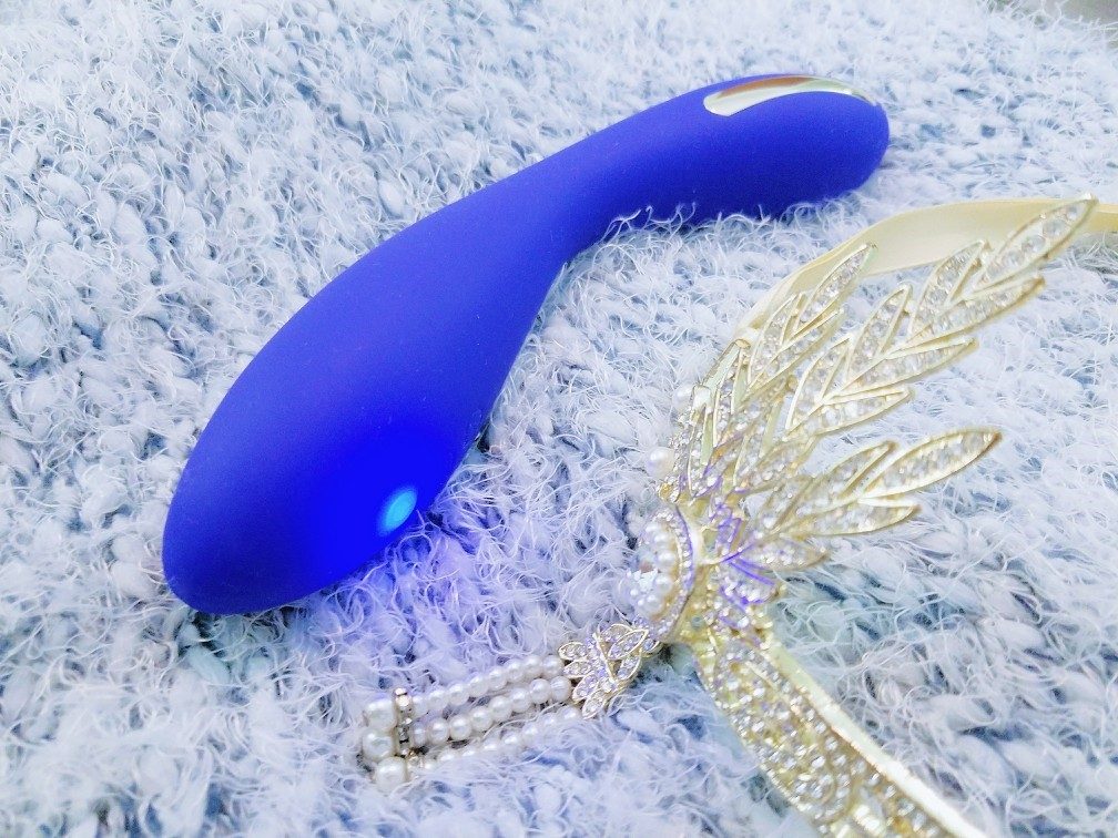 Image: The California Exotics Impulse Intimate E-stimulation wand has three buttons that glow when the respective functions are turned on.