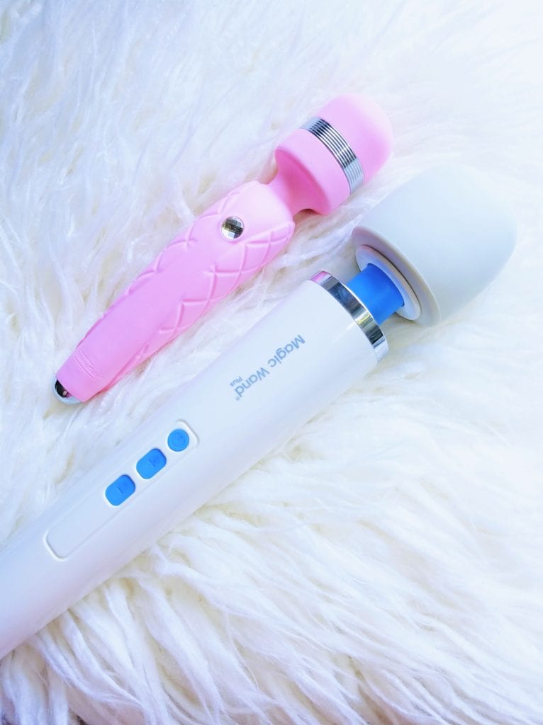 [Image: pink Pillow Talk Cheeky mini-wand vibrator next to Magic Wand Plus]
