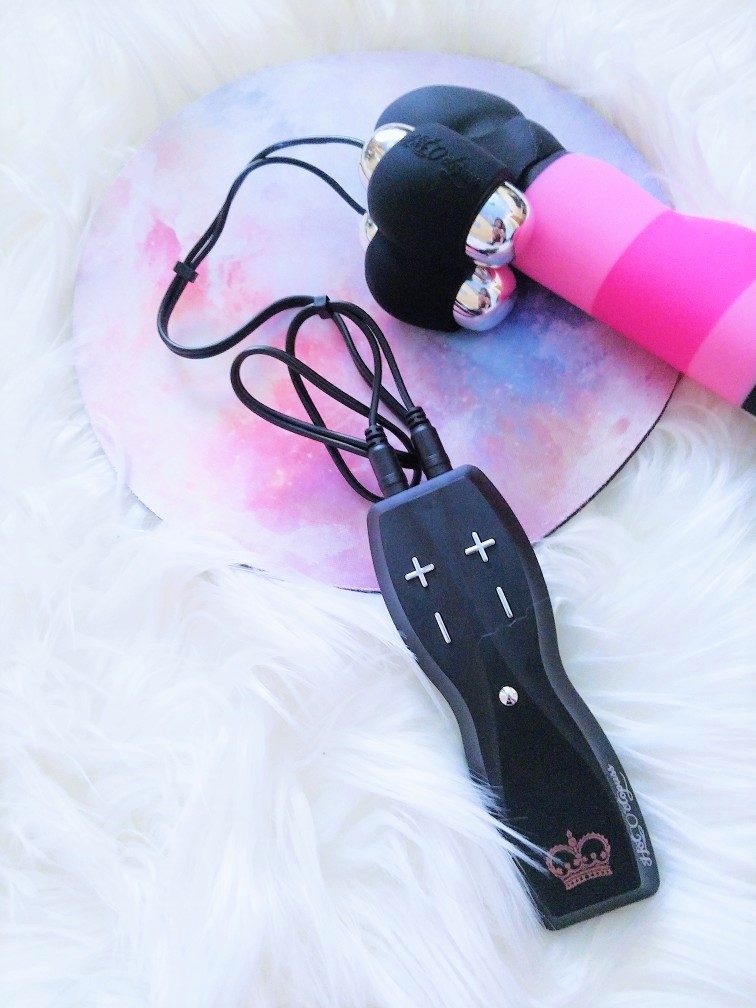 [Image: the Hot Octopuss Jett with the bullets in the silicone ring and wrapped around the head of the Blush Novelties Avant D4 Pretty In Pink dildo]