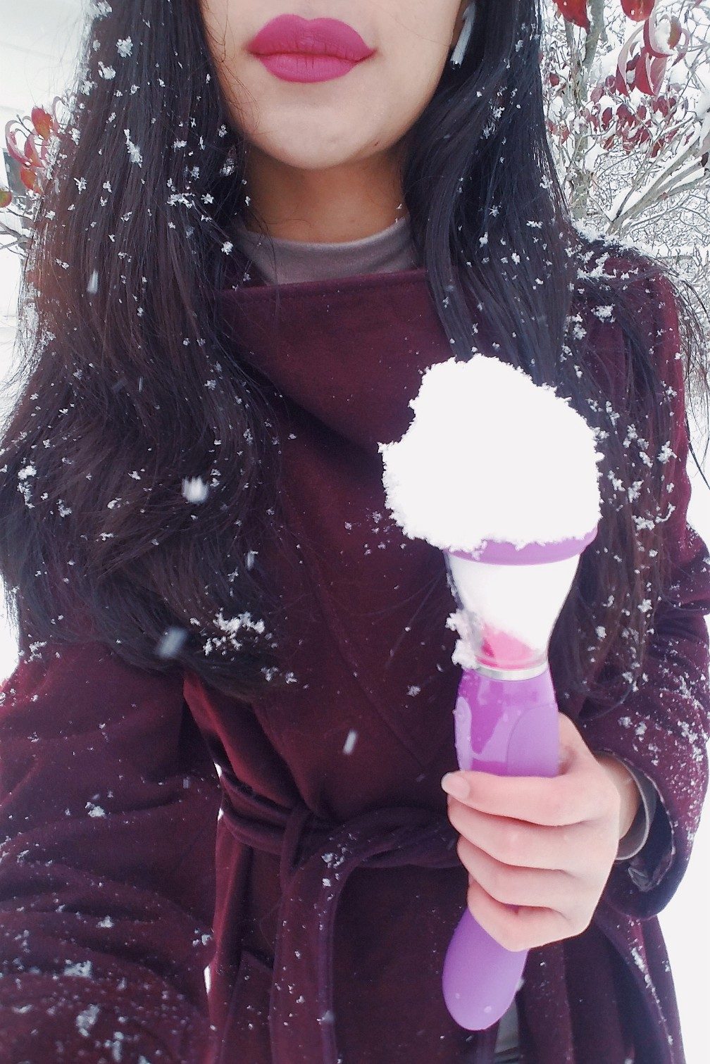 [Image: girl with long black hair holding the insertable handle and using the Fantasy For Her Ultimate Pleasure's suction cup attachment to hold a snow cone outside.[/note]
