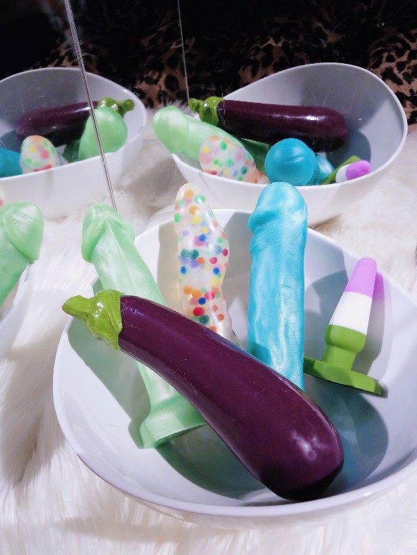 [Image: indie artisan silicone dildos and plugs in a white bowl]