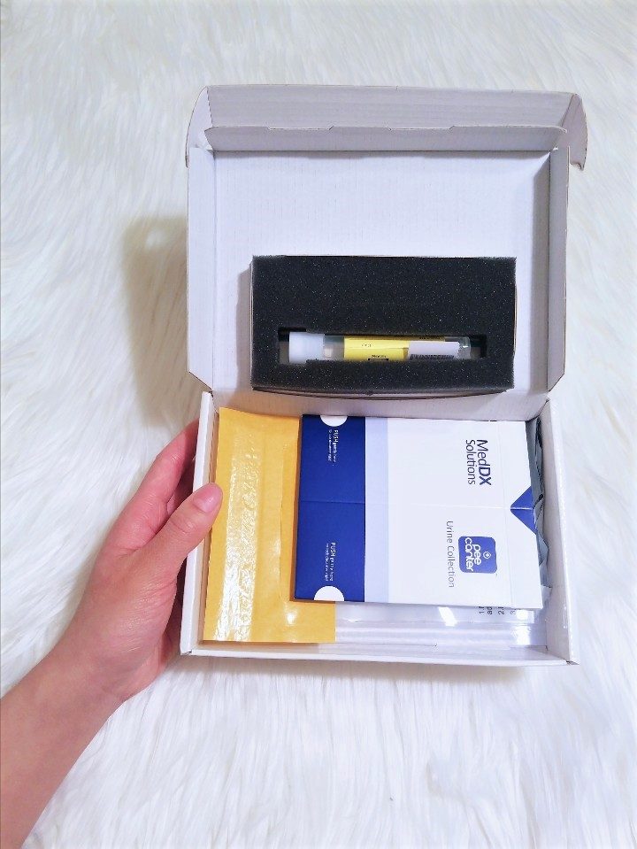 [Image: contents of the LetsGetChecked mail-in urine STI test for gonorrhea, chlamydia, and trichomoniasis.]