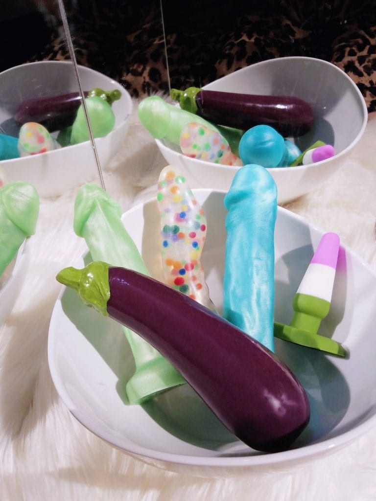 Self Delve Eggplant aubergine dildo among other exotic colored dildos