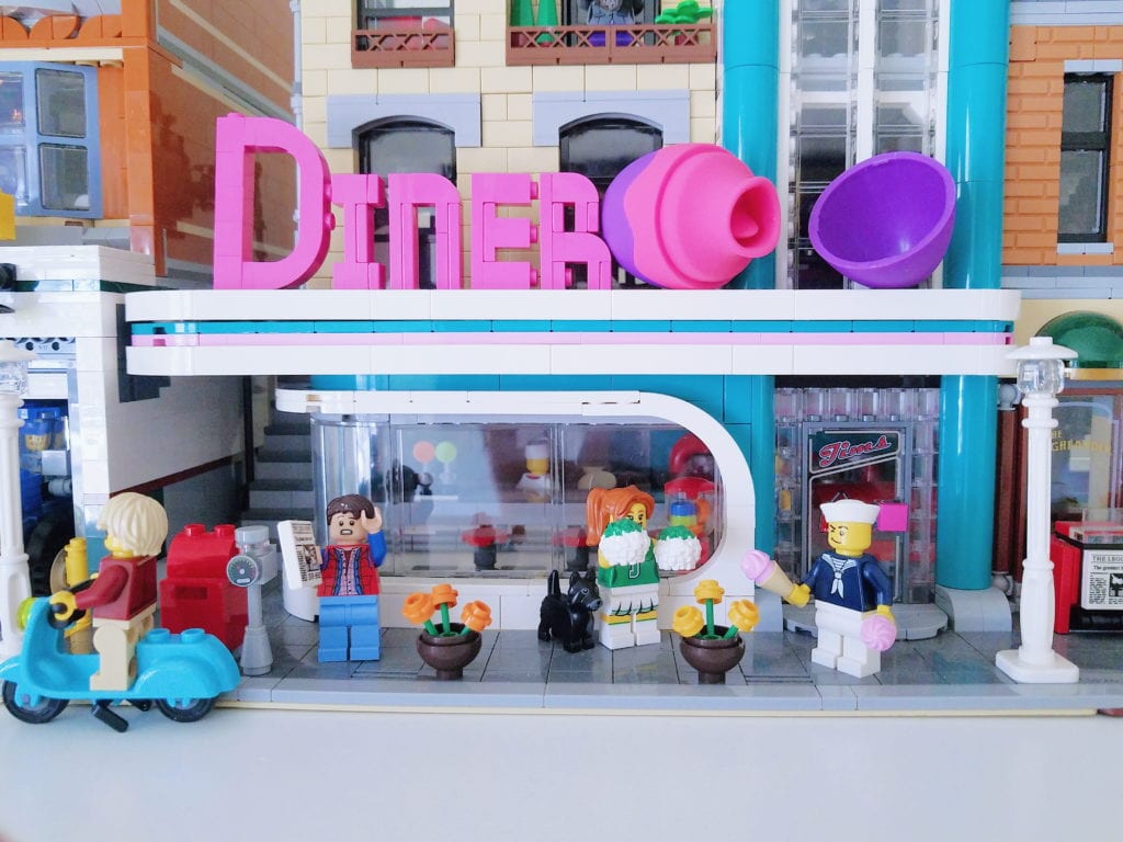 [Image: Blush Novelties Aria Flutter flickering vibrator among Lego city]