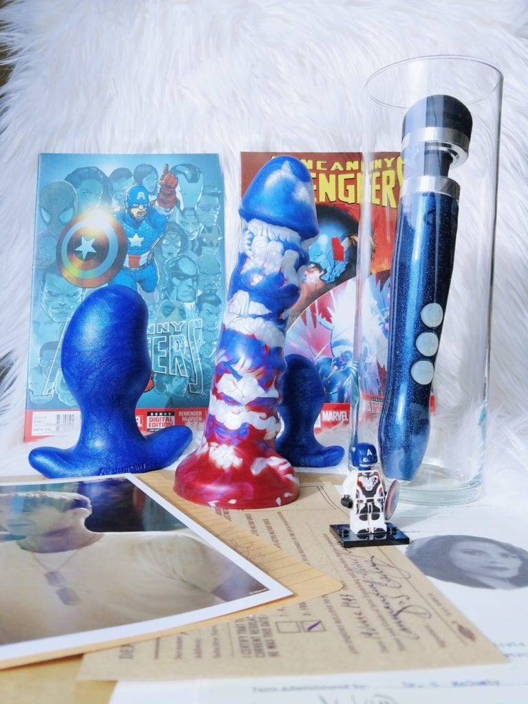 [Image: blue shimmer Oxballs Ergo plug next to photo of Steve Rogers, Uberrime A-Spot Avengers Patriot red white and blue marbled dildo, and Doxy Die Cast]