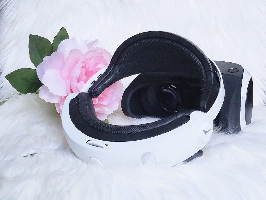 [Image: black and white Sony Playstation VR headset]