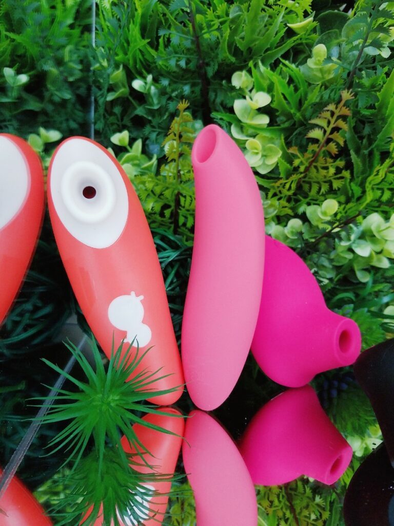 [Image: ROMP Toys Switch pressure wave clitoral sucker, orange We-Vibe Melt, and pink LELO Sona 2]