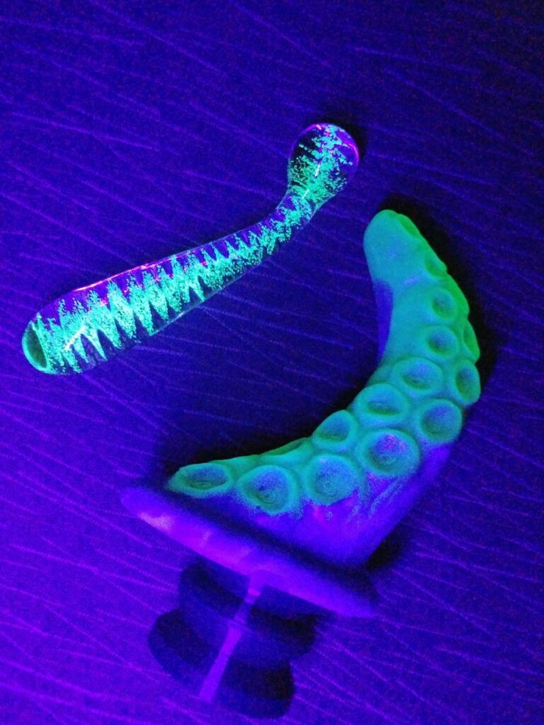 Uberrime Deep Diver Glow-in-the-Dark Tentacle Dildo with suction cup and NS Firefly Glass dildo