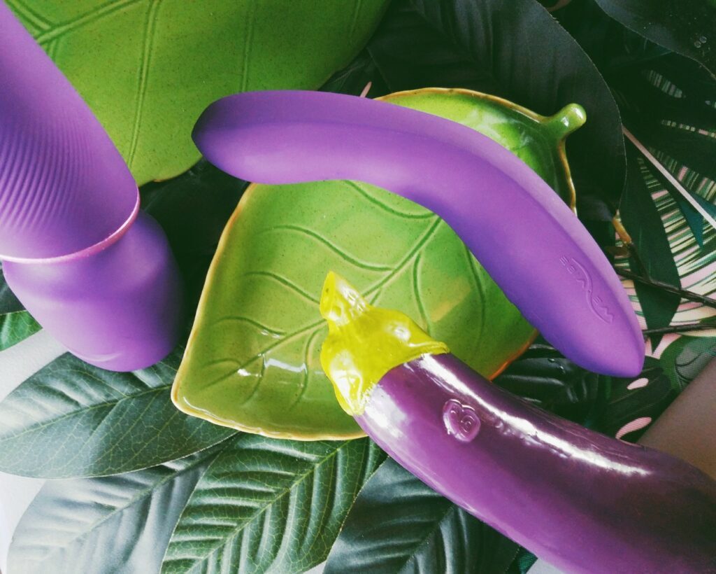 We-Vibe Rave Review: a rumbly G-spot & A-spot vibrator! 1 We-Vibe Wand, We-Vibe Rave G-spot vibrator, and Self Delve Eggplant dildo