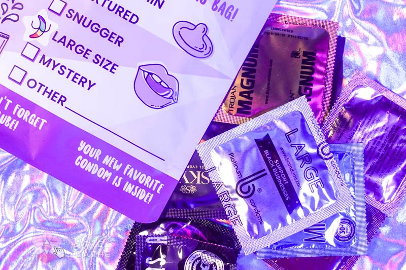 Condoms 101: Choosing the Perfect Condoms For You! 3 A pile of Condoms from Condomania's large size sampler pack