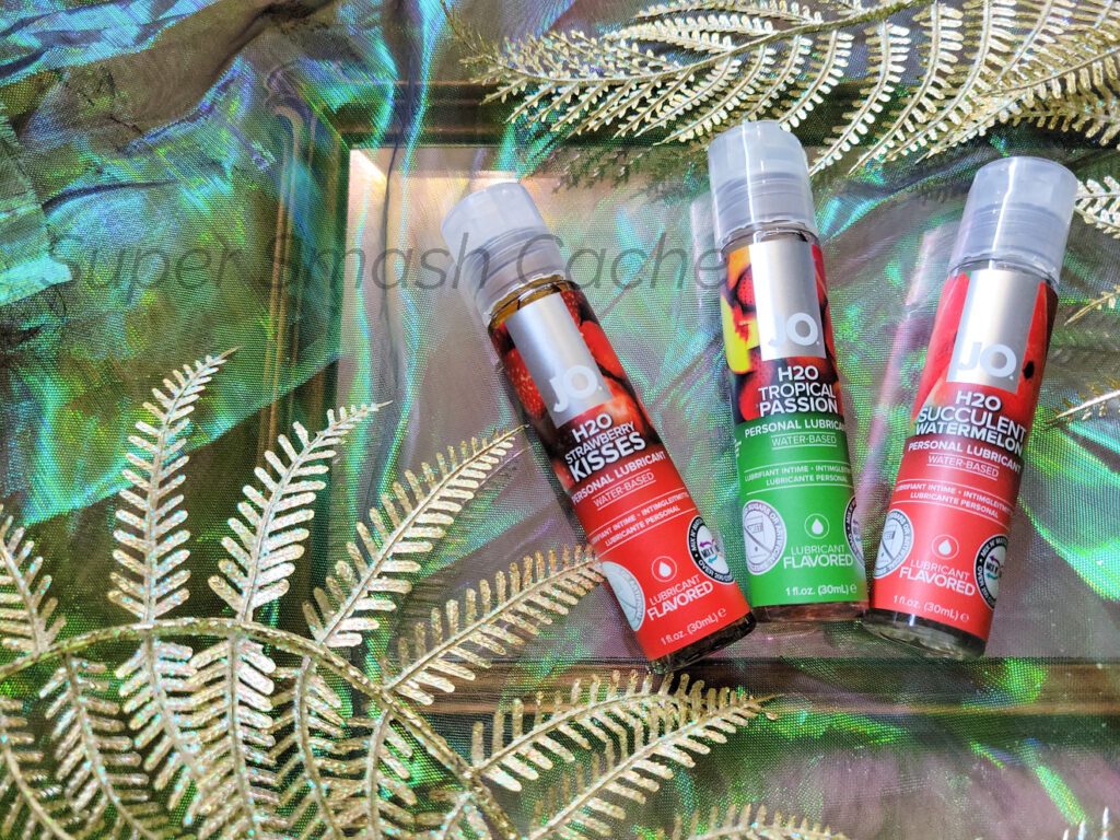 System Jo Flavors Tri-Me Triple Pack Flavors with 1 oz (30 mL) bottles of their Strawberry Kisses, H2O Tropical Passion, and H2O succulent watermelon flavored personal lubricants