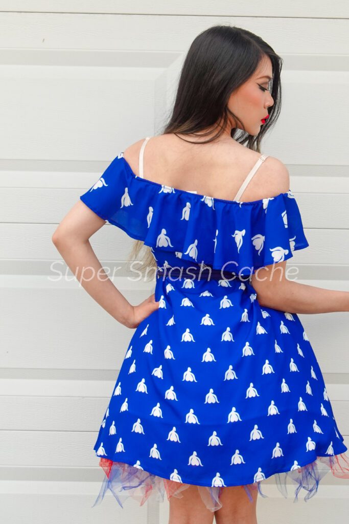 Blue clitoris print pinup dress with off-shoulder ruffles rear view with petticoats