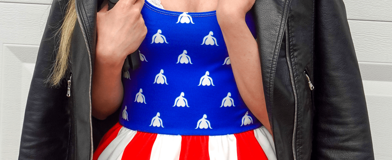 Red white and blue clitoris print dress inspired by the American flag. Close-up with leather jacket.