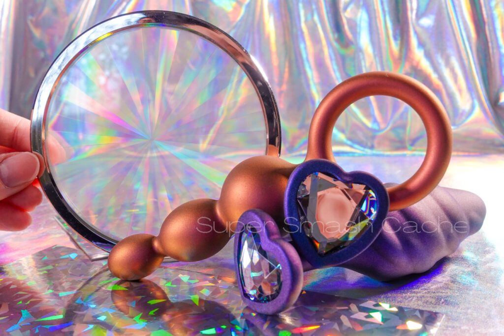 b-vibe beaded anal bead with retrieval loop and sparkling textured jewel princess plug plug with heart-shaped base