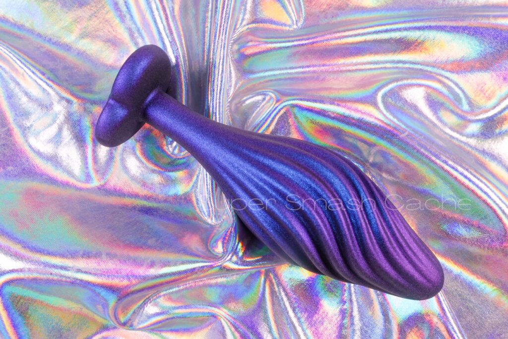 a close-up of the blush novelties anal adventures matrix swirled princess plug rippling textures 