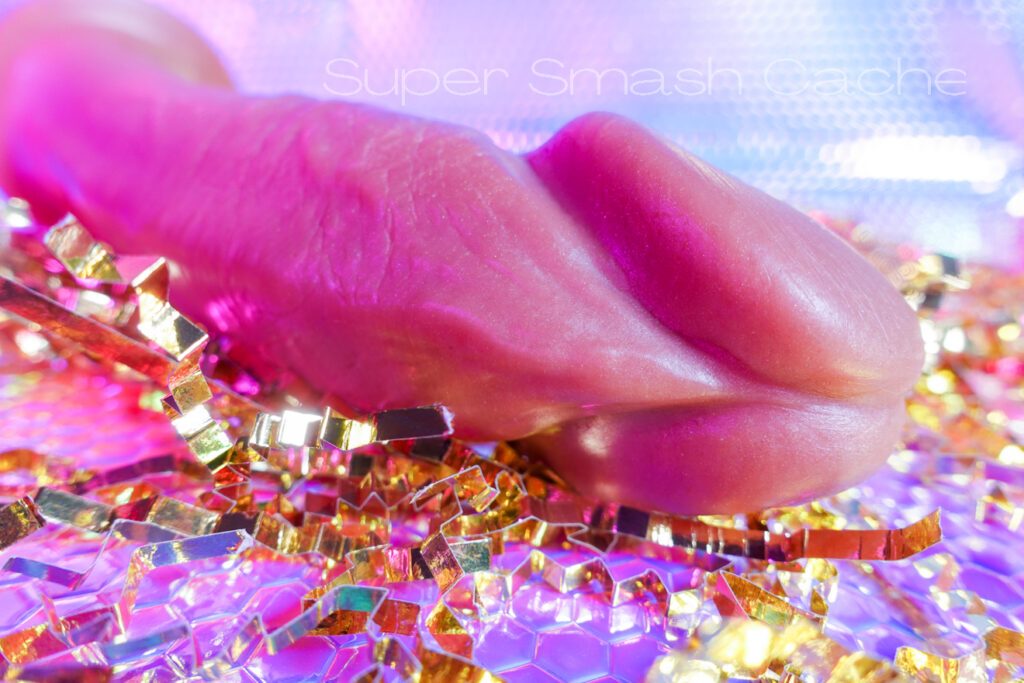 Review: Uberrime Aptus 8.5” realistic dildo & Fun Factory Big Boss vibrator 5 Uberrime Aptus head underside, showing the corpus spongiosum, frenulum, corona, glans, and slight foreskin.