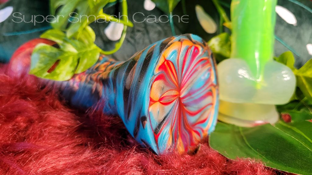 Uberrime Anurian platinum silicone dildo marbling in Amazonian color scheme