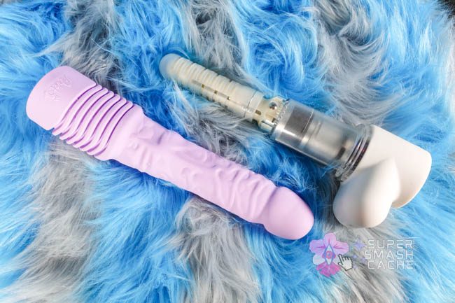 Velvet Thruster Prime Jackie original dildo attachment next to handheld fucking machine screw machinery
