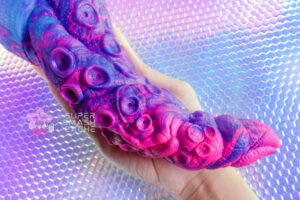 Uberrime Kraken's Revenge artisanal silicone tentacle dildo in hand
