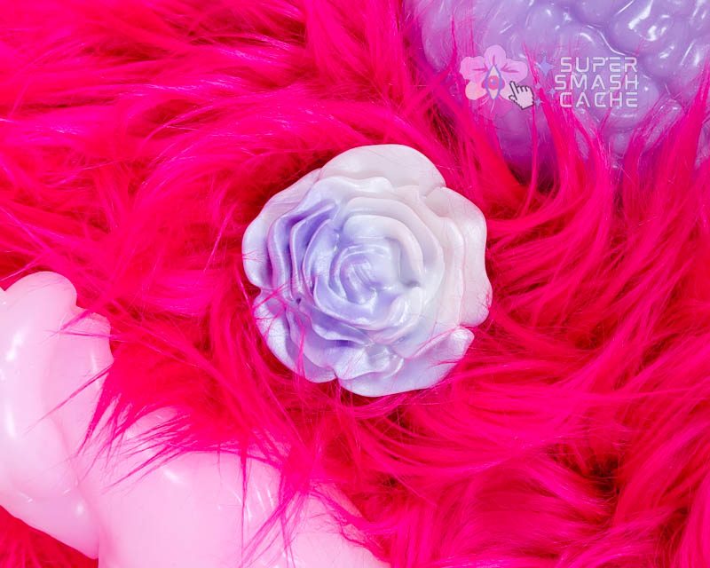 Uberrime Rosae silicone clitoral grinder humping toy in pearl purple and white