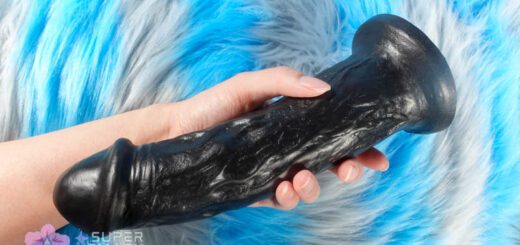 VixSkin Cash large realistic dildo in hand