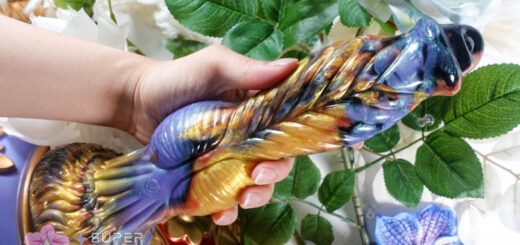 BestVibe Phoenix self-thrusting monster cock in hand