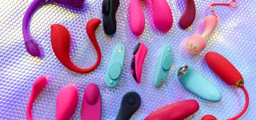 A collection of remote control panty vibrators arranged on holographic background