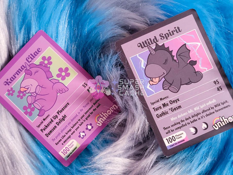 The Unihorn Karma Lilac and Wild Spirit unicorn vibrators come with cute AF trading cards