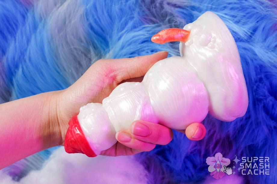 Review: Uberrime Happy (Boner) Snowman Dildo 3 Uberrime Happy Snowman dildo in hand for size comparison. This dil is quite thick!