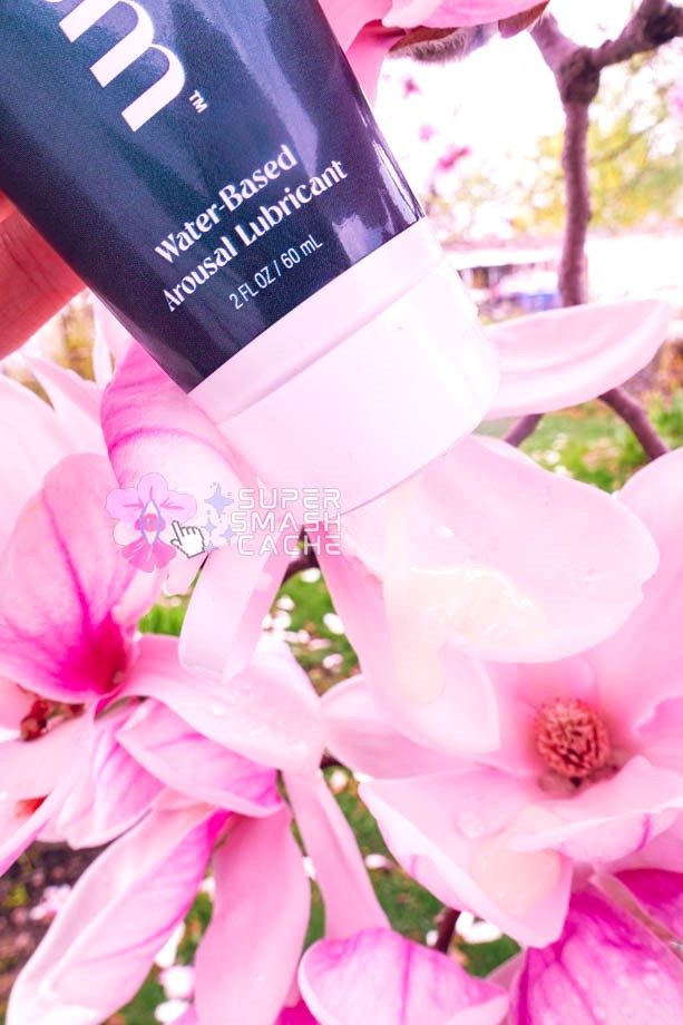Morgasm CBD lube dripping on flower petals