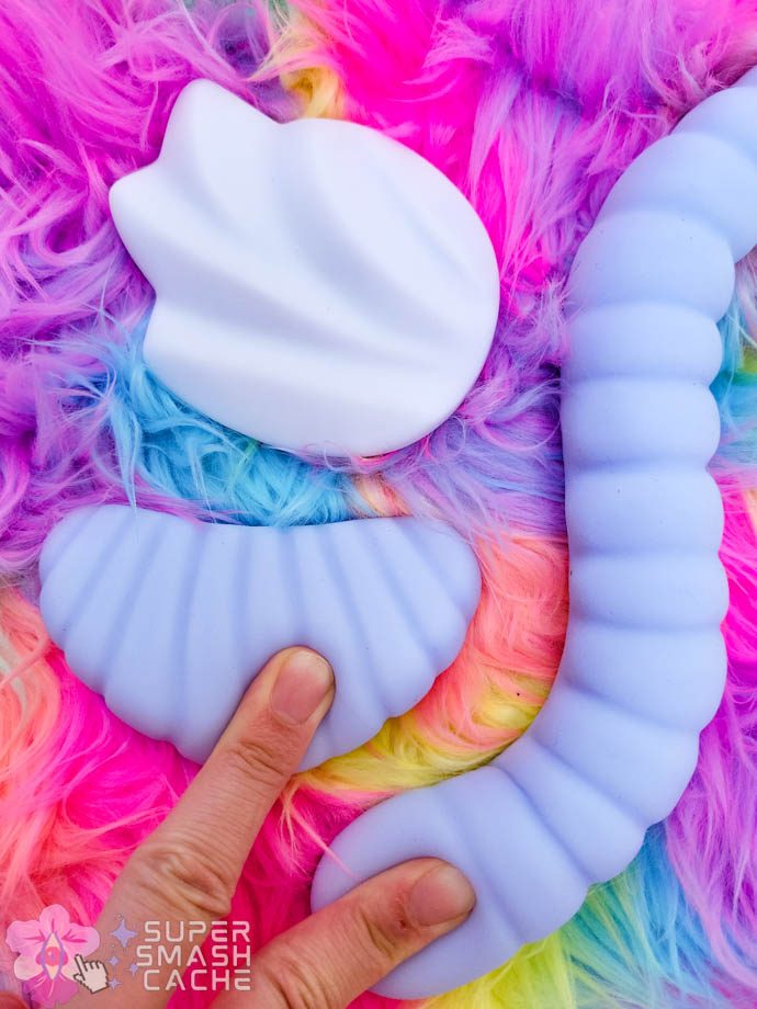 Pelle Flex, Orange Slice, and Gummy Worm silicone squishiness against my fingers