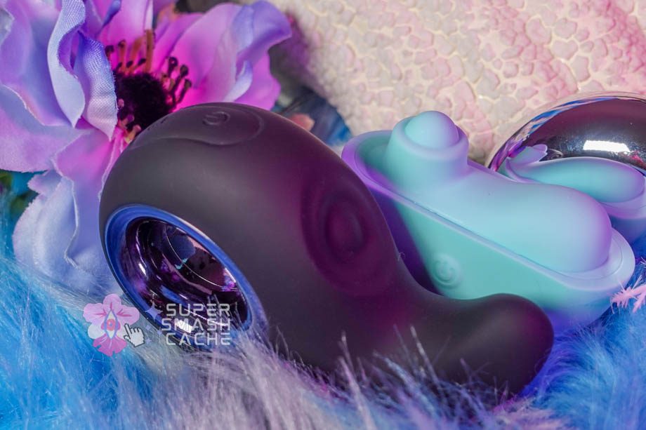 Top view of the Playboy Pleasure Ring My Bell's pulse plate and Cal Exotics' Ovation Acclaim