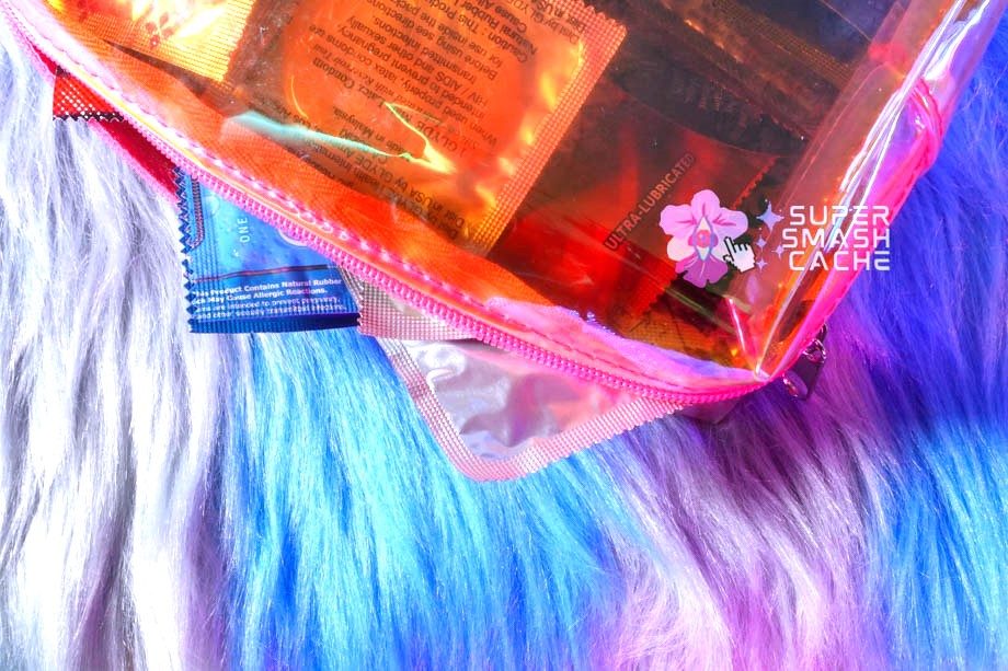 Condoms in holographic travel bag