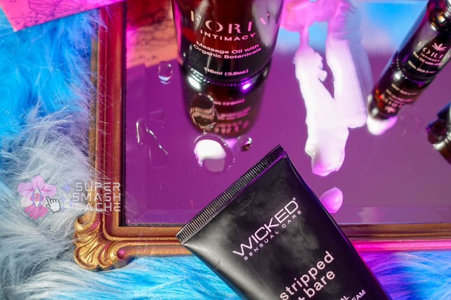 Dripping and spreading massage oil and cream on a mirror