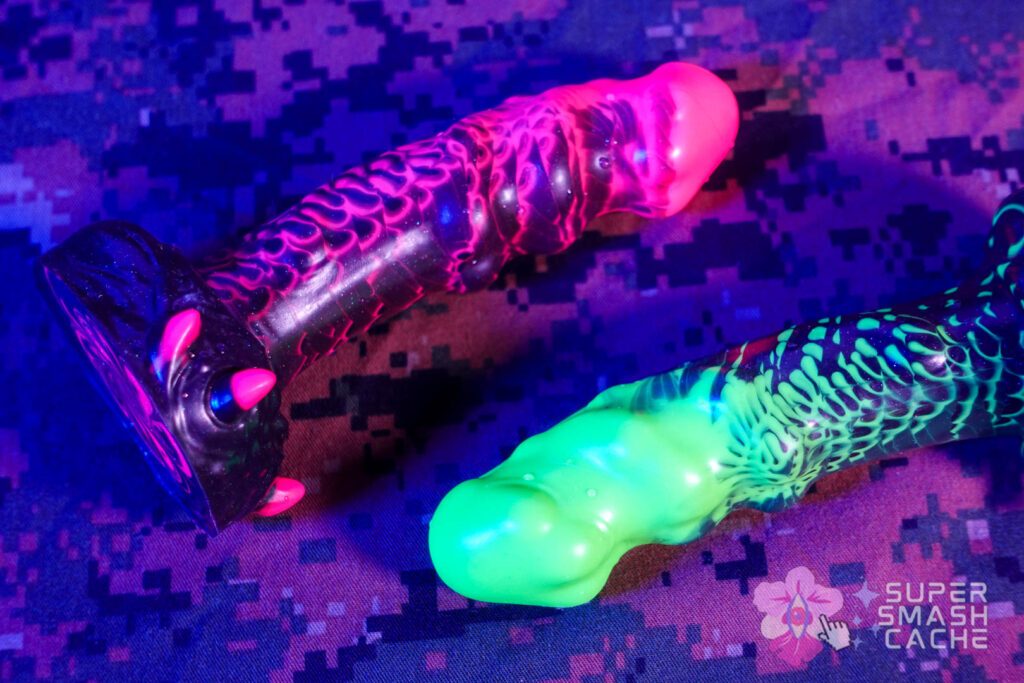 Uberrime Damn Alien textured massager dildo in UV Pink and UV green