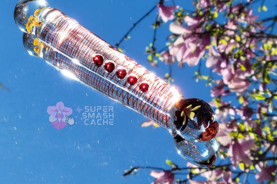 Gleaming glass dildo