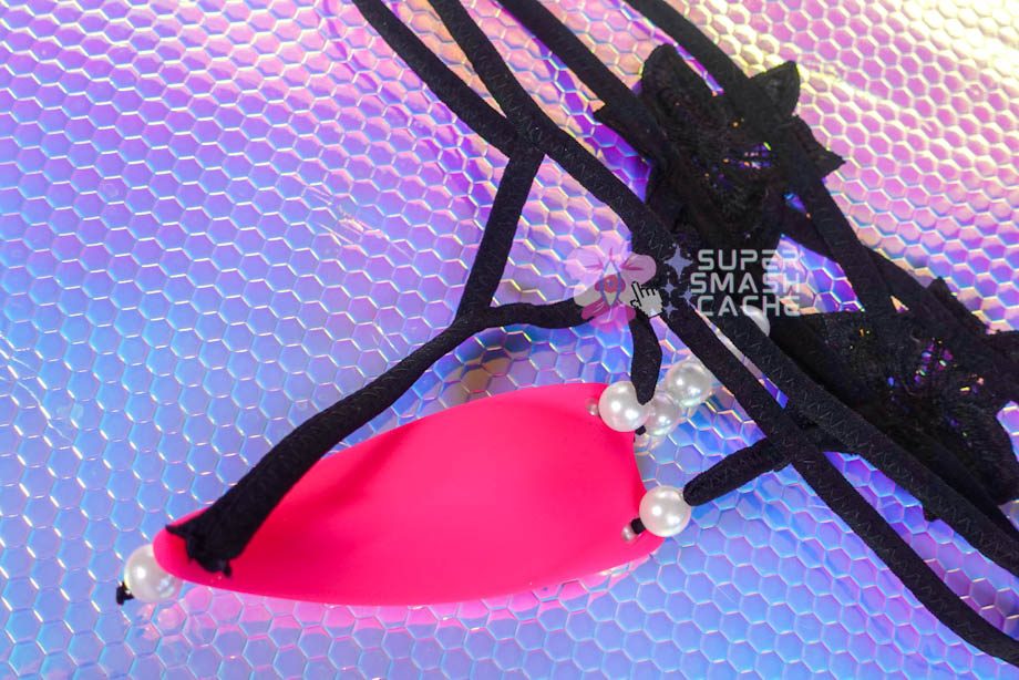 Panty vibrator with removable lace thong