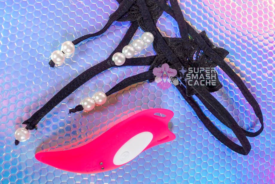 Remote control panty vibrator with removable lace and pearl thong