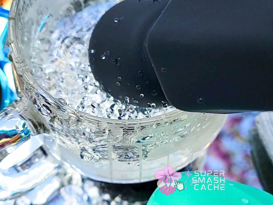EdenFantasys Sleek Power Wand massager vibrations splashing in water