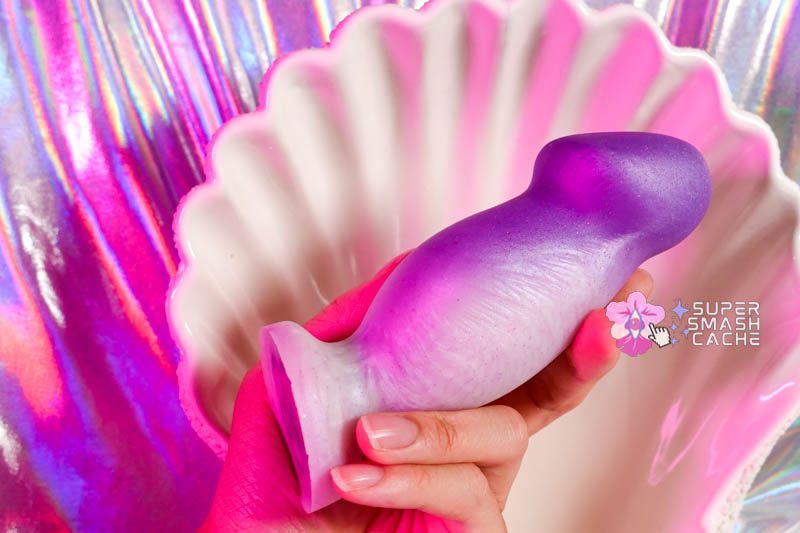 9 Silicone Pussy Plugs, Compared: G Squeeze, Sensi & MORE 7 Uberrime Sensi super soft silicone pussy plug and G-spot dildo in hand