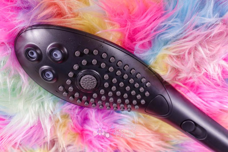 Okay, Fine: The Womanizer Wave Showerhead Grew on Me. 1 Black Womanizer Wave showerhead for clitoral pleasure by Hansgrohe
