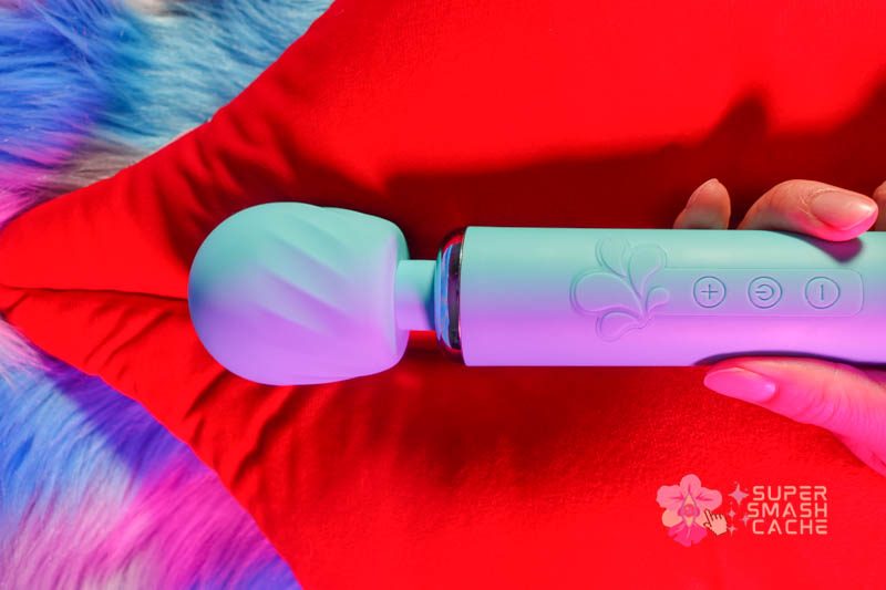 Maia Nala Wand Review: 5 Reasons to Love This Massager 6 Maia Nala waterproof wand massager with rumbly vibrations and textured head in hand