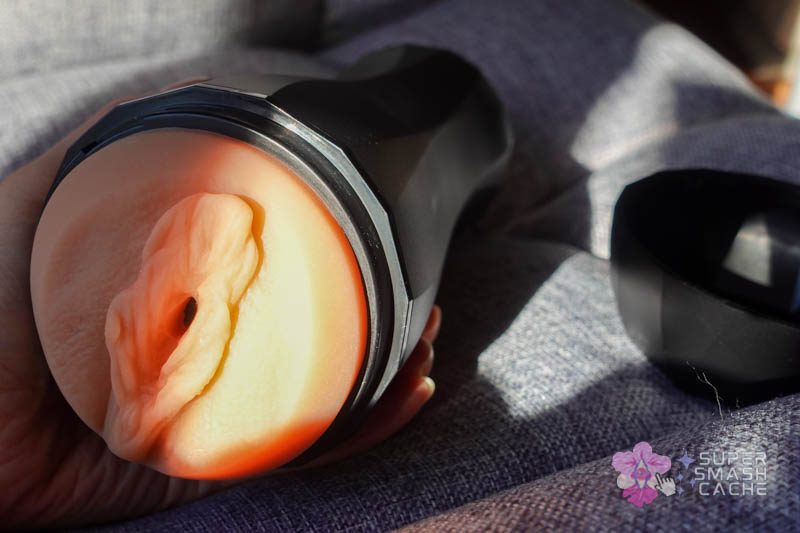Realistic vulva stroker opening