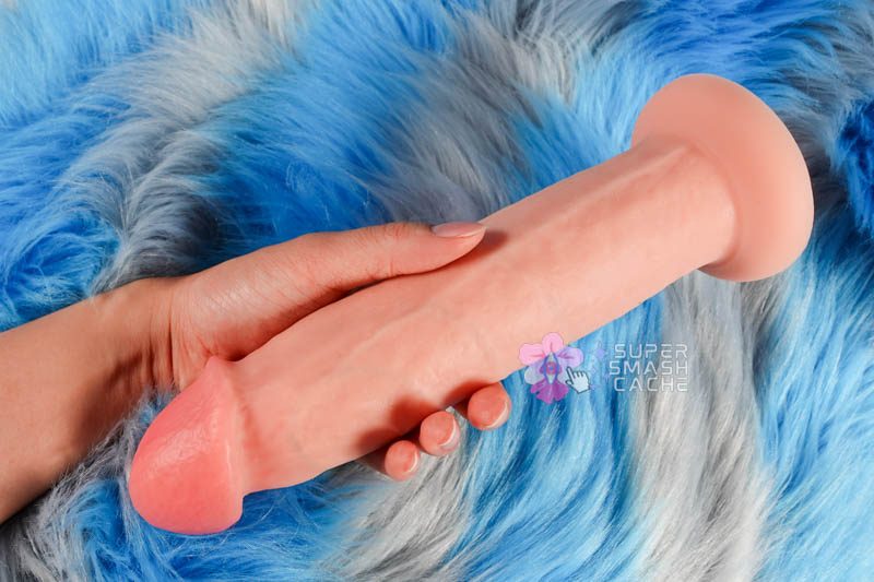 Ranking the Most Realistic & Sliding Skin Dildos: RealCock, Jock, Valm & More 6 Jock Real Skin 8.5 Inch veiny ultra realistic silicone dildo in hand